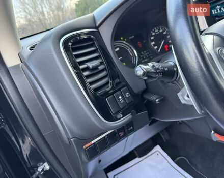 Чорний Міцубісі Аутлендер, об'ємом двигуна 2 л та пробігом 157 тис. км за 15299 $, фото 73 на Automoto.ua