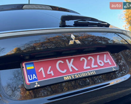 Чорний Міцубісі Аутлендер, об'ємом двигуна 2 л та пробігом 173 тис. км за 15299 $, фото 68 на Automoto.ua