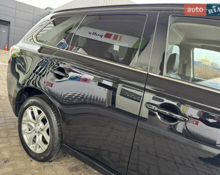 Чорний Міцубісі Аутлендер, об'ємом двигуна 2 л та пробігом 157 тис. км за 15299 $, фото 17 на Automoto.ua