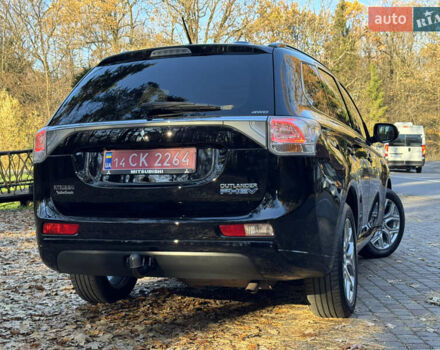 Чорний Міцубісі Аутлендер, об'ємом двигуна 2 л та пробігом 173 тис. км за 15299 $, фото 47 на Automoto.ua