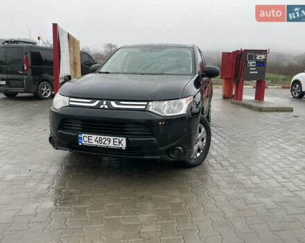 Чорний Міцубісі Аутлендер, об'ємом двигуна 2.4 л та пробігом 150 тис. км за 12200 $, фото 1 на Automoto.ua