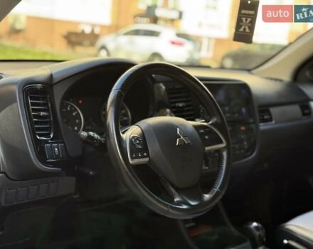 Черный Мицубиси Аутлендер, объемом двигателя 2.4 л и пробегом 270 тыс. км за 12500 $, фото 20 на Automoto.ua