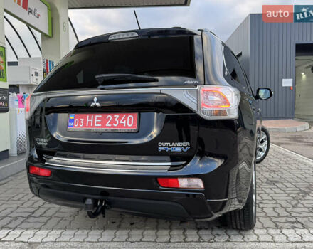 Чорний Міцубісі Аутлендер, об'ємом двигуна 2 л та пробігом 157 тис. км за 15299 $, фото 43 на Automoto.ua
