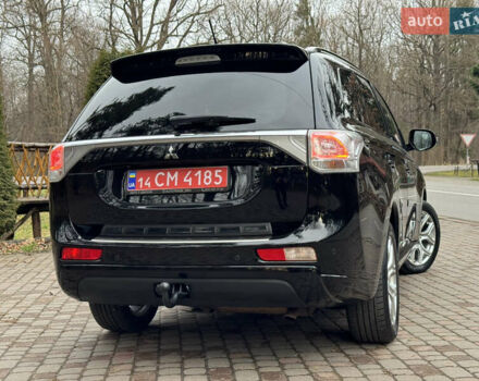 Черный Мицубиси Аутлендер, объемом двигателя 2 л и пробегом 173 тыс. км за 15299 $, фото 37 на Automoto.ua