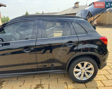 Чорний Міцубісі Аутлендер, об'ємом двигуна 2 л та пробігом 211 тис. км за 9500 $, фото 3 на Automoto.ua