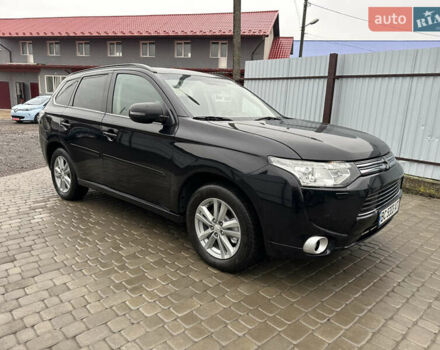 Черный Мицубиси Аутлендер, объемом двигателя 2 л и пробегом 223 тыс. км за 13400 $, фото 2 на Automoto.ua
