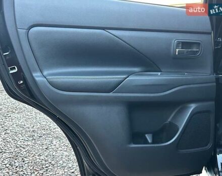 Чорний Міцубісі Аутлендер, об'ємом двигуна 2.4 л та пробігом 199 тис. км за 12800 $, фото 25 на Automoto.ua