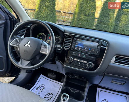 Чорний Міцубісі Аутлендер, об'ємом двигуна 2 л та пробігом 173 тис. км за 15299 $, фото 103 на Automoto.ua