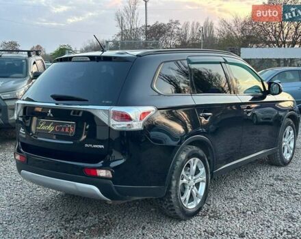 Чорний Міцубісі Аутлендер, об'ємом двигуна 2.4 л та пробігом 199 тис. км за 12800 $, фото 4 на Automoto.ua