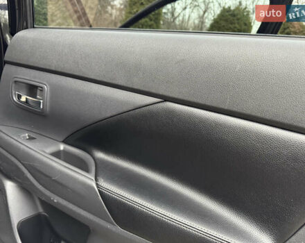 Черный Мицубиси Аутлендер, объемом двигателя 2 л и пробегом 173 тыс. км за 15299 $, фото 102 на Automoto.ua