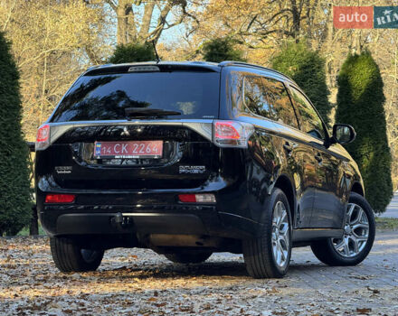 Чорний Міцубісі Аутлендер, об'ємом двигуна 2 л та пробігом 173 тис. км за 15299 $, фото 44 на Automoto.ua