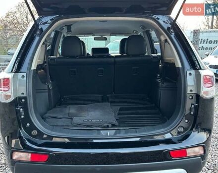 Чорний Міцубісі Аутлендер, об'ємом двигуна 2.4 л та пробігом 199 тис. км за 12800 $, фото 27 на Automoto.ua