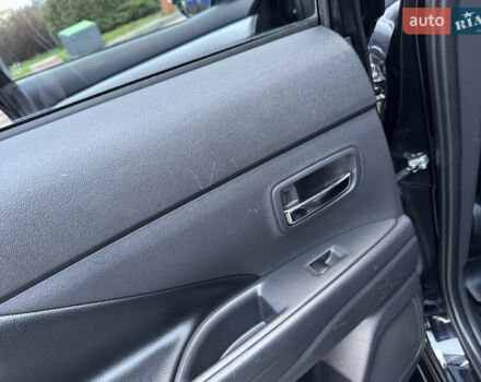 Чорний Міцубісі Аутлендер, об'ємом двигуна 2 л та пробігом 157 тис. км за 15299 $, фото 93 на Automoto.ua