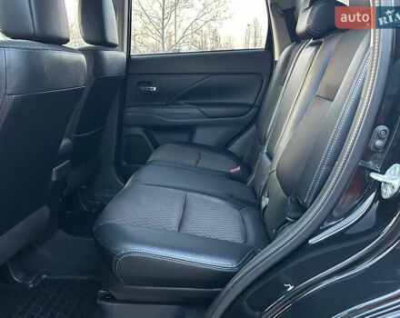 Чорний Міцубісі Аутлендер, об'ємом двигуна 2.4 л та пробігом 199 тис. км за 12800 $, фото 26 на Automoto.ua