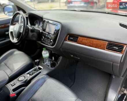 Черный Мицубиси Аутлендер, объемом двигателя 2.4 л и пробегом 231 тыс. км за 12600 $, фото 24 на Automoto.ua