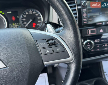 Чорний Міцубісі Аутлендер, об'ємом двигуна 2 л та пробігом 157 тис. км за 15299 $, фото 76 на Automoto.ua