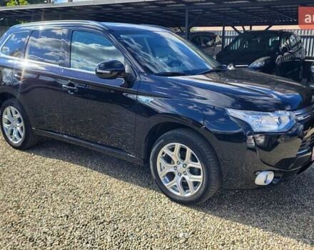 Чорний Міцубісі Аутлендер, об'ємом двигуна 2 л та пробігом 237 тис. км за 13800 $, фото 9 на Automoto.ua