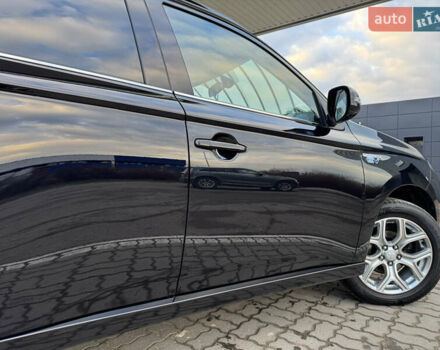 Чорний Міцубісі Аутлендер, об'ємом двигуна 2 л та пробігом 157 тис. км за 15299 $, фото 50 на Automoto.ua