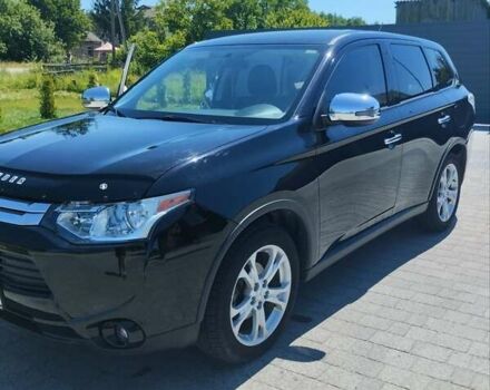 Черный Мицубиси Аутлендер, объемом двигателя 2.42 л и пробегом 148 тыс. км за 13000 $, фото 12 на Automoto.ua