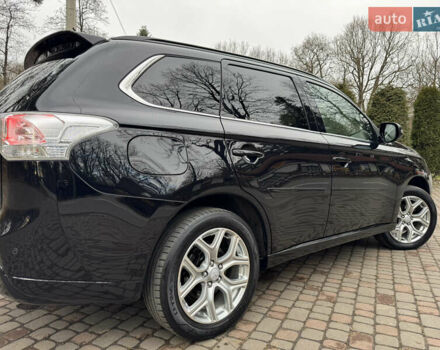 Черный Мицубиси Аутлендер, объемом двигателя 2 л и пробегом 173 тыс. км за 15299 $, фото 45 на Automoto.ua