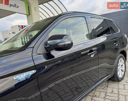 Чорний Міцубісі Аутлендер, об'ємом двигуна 2 л та пробігом 157 тис. км за 15299 $, фото 32 на Automoto.ua