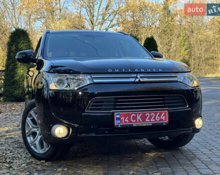 Чорний Міцубісі Аутлендер, об'ємом двигуна 2 л та пробігом 173 тис. км за 15299 $, фото 4 на Automoto.ua