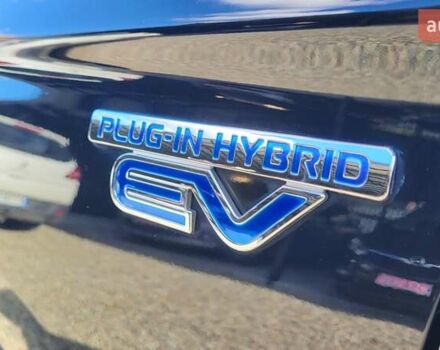 Чорний Міцубісі Аутлендер, об'ємом двигуна 2 л та пробігом 237 тис. км за 13800 $, фото 12 на Automoto.ua