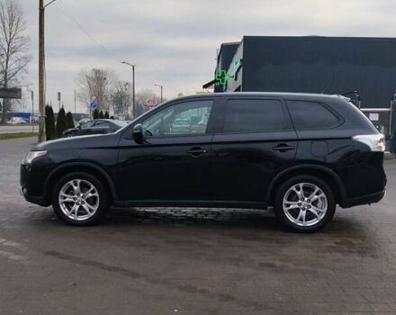 Чорний Міцубісі Аутлендер, об'ємом двигуна 2.4 л та пробігом 224 тис. км за 12000 $, фото 2 на Automoto.ua