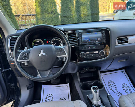 Чорний Міцубісі Аутлендер, об'ємом двигуна 2 л та пробігом 173 тис. км за 15299 $, фото 106 на Automoto.ua