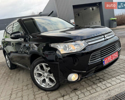 Чорний Міцубісі Аутлендер, об'ємом двигуна 2 л та пробігом 157 тис. км за 15299 $, фото 6 на Automoto.ua