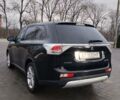 Чорний Міцубісі Аутлендер, об'ємом двигуна 2.4 л та пробігом 224 тис. км за 12000 $, фото 13 на Automoto.ua