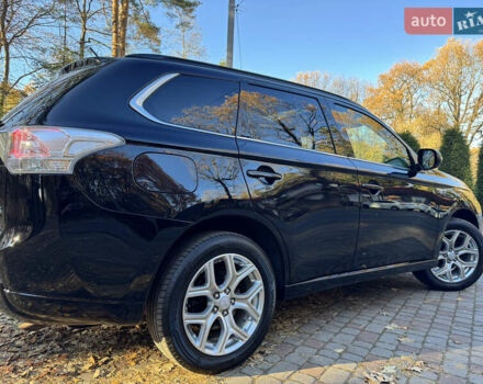 Чорний Міцубісі Аутлендер, об'ємом двигуна 2 л та пробігом 173 тис. км за 15299 $, фото 55 на Automoto.ua