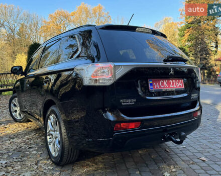 Чорний Міцубісі Аутлендер, об'ємом двигуна 2 л та пробігом 173 тис. км за 15299 $, фото 64 на Automoto.ua