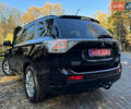 Чорний Міцубісі Аутлендер, об'ємом двигуна 2 л та пробігом 173 тис. км за 15299 $, фото 64 на Automoto.ua