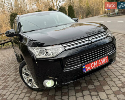 Черный Мицубиси Аутлендер, объемом двигателя 2 л и пробегом 173 тыс. км за 15299 $, фото 6 на Automoto.ua