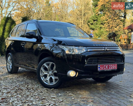 Чорний Міцубісі Аутлендер, об'ємом двигуна 2 л та пробігом 173 тис. км за 15299 $, фото 3 на Automoto.ua