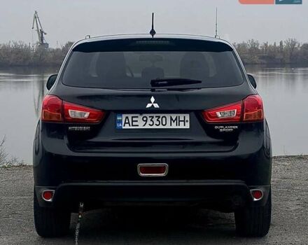 Чорний Міцубісі Аутлендер, об'ємом двигуна 2 л та пробігом 250 тис. км за 10800 $, фото 9 на Automoto.ua