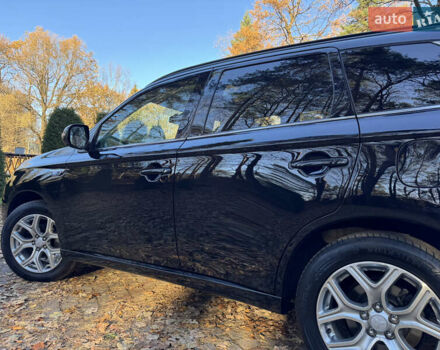 Чорний Міцубісі Аутлендер, об'ємом двигуна 2 л та пробігом 173 тис. км за 15299 $, фото 73 на Automoto.ua