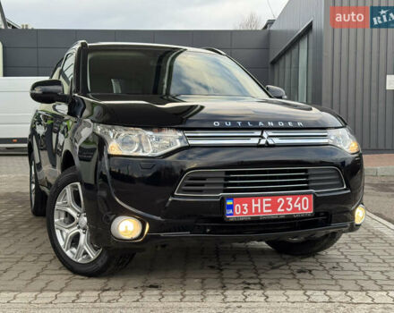 Чорний Міцубісі Аутлендер, об'ємом двигуна 2 л та пробігом 157 тис. км за 15299 $, фото 4 на Automoto.ua