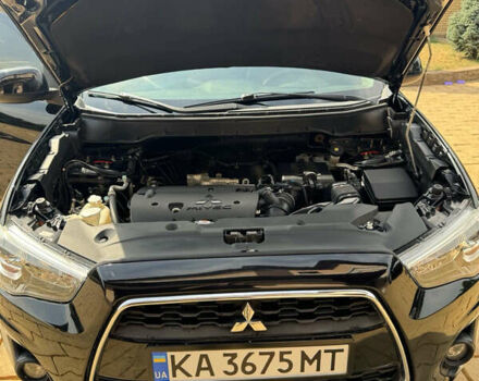Чорний Міцубісі Аутлендер, об'ємом двигуна 2 л та пробігом 211 тис. км за 9500 $, фото 10 на Automoto.ua