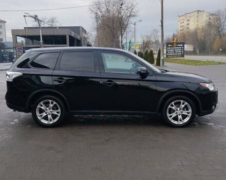 Чорний Міцубісі Аутлендер, об'ємом двигуна 2.4 л та пробігом 224 тис. км за 12000 $, фото 12 на Automoto.ua
