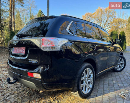 Чорний Міцубісі Аутлендер, об'ємом двигуна 2 л та пробігом 173 тис. км за 15299 $, фото 54 на Automoto.ua
