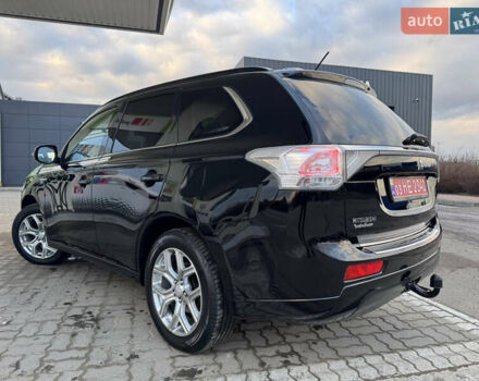 Чорний Міцубісі Аутлендер, об'ємом двигуна 2 л та пробігом 157 тис. км за 15299 $, фото 62 на Automoto.ua