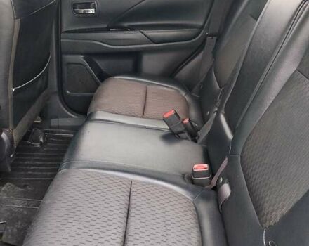 Чорний Міцубісі Аутлендер, об'ємом двигуна 2.4 л та пробігом 224 тис. км за 12000 $, фото 15 на Automoto.ua