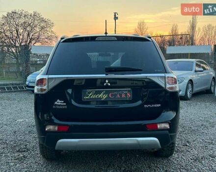 Чорний Міцубісі Аутлендер, об'ємом двигуна 2.4 л та пробігом 199 тис. км за 12800 $, фото 5 на Automoto.ua