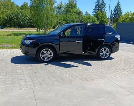 Черный Мицубиси Аутлендер, объемом двигателя 2.42 л и пробегом 148 тыс. км за 13000 $, фото 7 на Automoto.ua