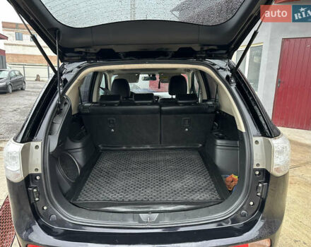 Черный Мицубиси Аутлендер, объемом двигателя 2 л и пробегом 223 тыс. км за 13400 $, фото 13 на Automoto.ua