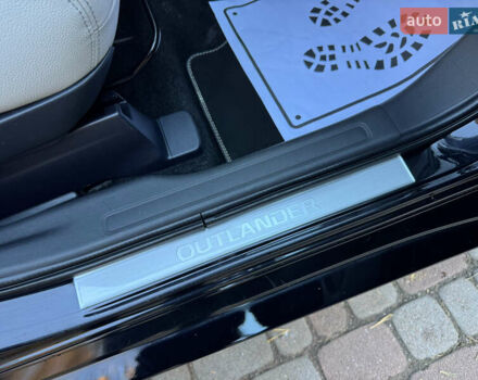 Чорний Міцубісі Аутлендер, об'ємом двигуна 2 л та пробігом 173 тис. км за 15299 $, фото 97 на Automoto.ua