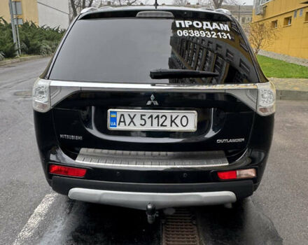 Черный Мицубиси Аутлендер, объемом двигателя 2.27 л и пробегом 244 тыс. км за 14000 $, фото 6 на Automoto.ua