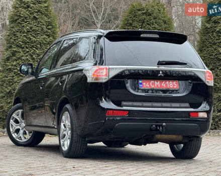 Черный Мицубиси Аутлендер, объемом двигателя 2 л и пробегом 173 тыс. км за 15299 $, фото 51 на Automoto.ua